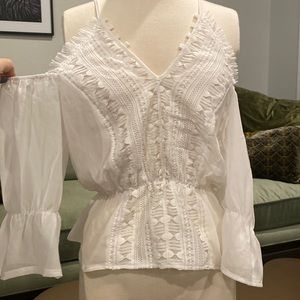 White top with floating sleeves